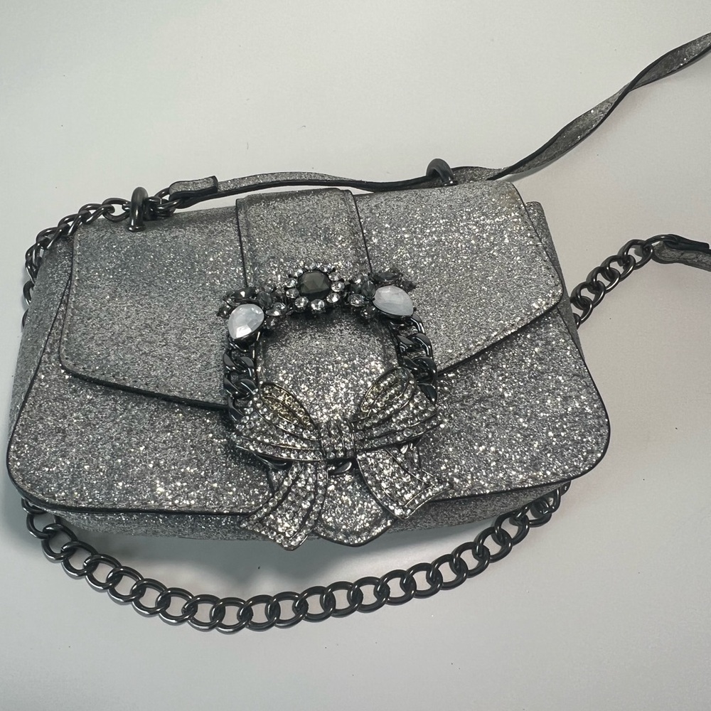 Aldo Glittery Silver Crossbody Bag with Embellished Bow